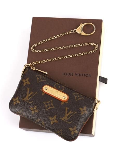 louis vuitton wristlet fake for sale|Louis Vuitton monogram wristlet.